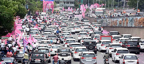 commuters halt near Somajiguda due to the TRS bike rally in Hyderad. (Photo | RVK Rao, EPS)