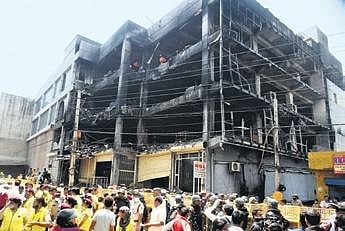 The remains of the commercial building that caught on fire in Delhi claiming 27 lives.