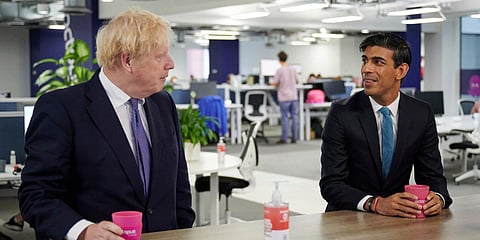 Boris Johnson (L) and Rishi Sunak seen together in happier days. (File Photo| AP)