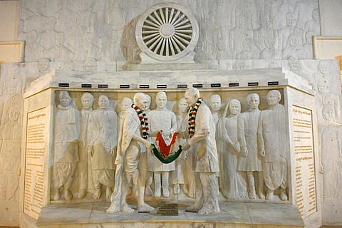 An artistic depiction of Pingali Venkayya handing over the national flag to Gandhiji at the 1921 AICC meet at Victoria Jubilee Hall, in Vijayawada.(Photo | Prasant Madugula)