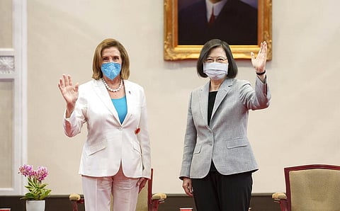U.S. House Speaker Nancy Pelosi, left, and Taiwanese President President Tsai Ing-wen wave during a meeting in Taipei, Taiwan, Wednesday, Aug. 3, 2022(Photo | AP)