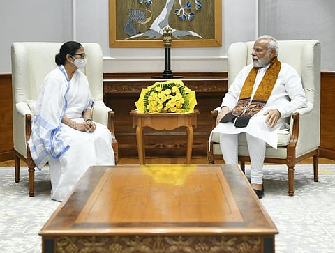 Prime Minister Narendra Modi with West Bengal CM Mamata Banerjee during a meeting in New Delhi. (Photo | PTI)
