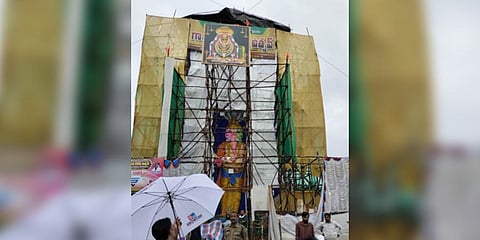 Barricades set up at the pandal to keep people 100 m away from the idol at Gajuwaka in Vizag | Express