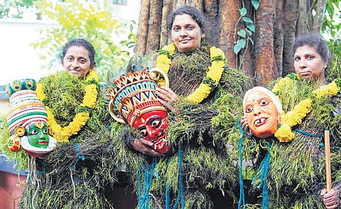 Sanitha, Sunitha and Sabitha dressed in kummattikkali attire at Kizhakkumpattukkara