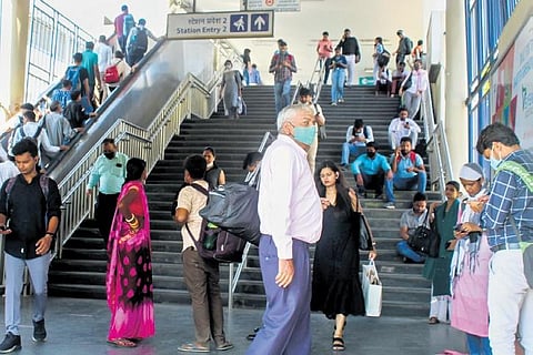 Commuters wait at the MG Road Metro Station amid a halt in train services | pti