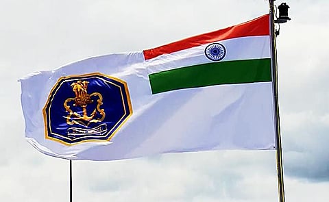 The new Naval Ensign 'Nishaan' has been hoisted by Prime Minister Narendra Modi on INS Vikrant during its commissioning ceremony, in Kochi on Sep 2. (Photo | ANI)