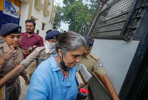 Social activist Teesta Setalvad being escorted to a session's court, in Ahmedabad, Saturday, Sept. 3, 2022. (File Photo | PTI)
