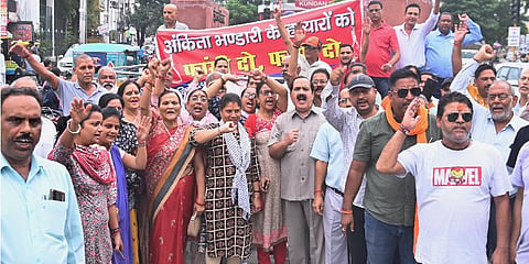Garhwal Sabha and Pahadi Mahaa Sabha members stage a protest over Ankita murder case, in Haridwar, on September 24, 2022. (Photo | PTI)