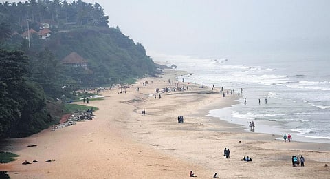 Tourists at Papanasam beach in Varkala | B P Deepu