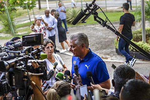 Cuba's President Miguel Diaz Canel speaks to the press after casting his vote at a polling station during the new Family Code referendum in Havana, Cuba, Sunday, Sept. 25, 2022. (Photo | AP)
