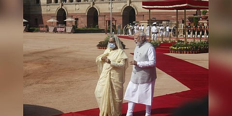 Prime Minister Narendra Modi shakes hand with Bangladesh Prime Minister Sheikh Hasina during ceremonial reception at president house in New Delhi. (Photo | Shekhar Yadav, EPS)