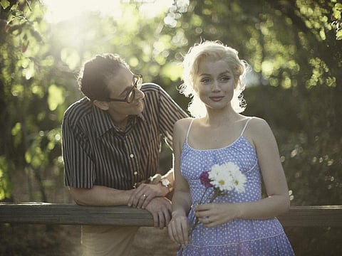 This image released by Netflix shows Adrien Brody, left, and Ana de Armas in 'Blonde.' (Netflix via AP)