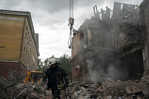 Firefighters work to extinguish a fire, looking for potential victims after a Russian attack that heavily damaged a residential building in Sloviansk, Ukraine, Wednesday, Sept. 7, 2022. (Photo | AP)