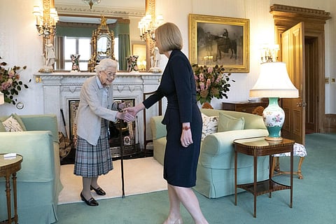 Britain's Queen Elizabeth II and Britain's Prime Minister-elect Liz Truss meet at Balmoral Castle in Ballater, Scotland. (File photo | AFP)