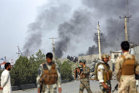 Smoke billows from the Green Village, home to several international organizations and guesthouses, in Kabul, Afghanistan. (Photo | AP)