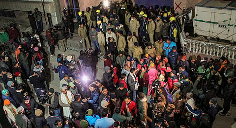 Locals protest against the demolision of the unsafe hotels and houses after cracks appeared at the landslide affected area of Joshimath, in Chamoli district, Tuesday, Jan. 10, 2023. (PTI )