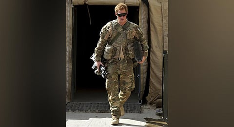 Britain's Prince Harry on patrol through the deserted town of Garmisir Jan. 2, 2008, close to FOB (forward operating base) Delhi, where he was posted in Helmand province Southern Afghanistan. (AP)