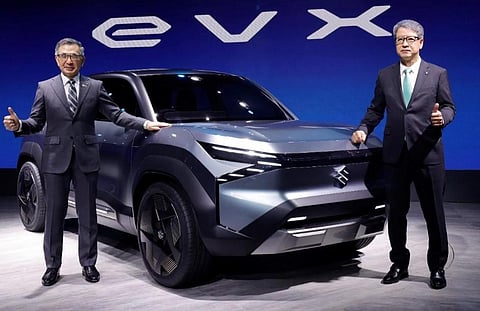 Maruti Suzuki MD, CEO Hisashi Takeuchi, Suzuki Motor Corp chief & Representative Director Toshihiro Suzuki unveil concept car 'EVX' at the Auto Expo 2023. (Photo | Special Arrangement)