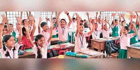 Students of Thalakkani GUP School during a ‘laughing bell’ session | Express