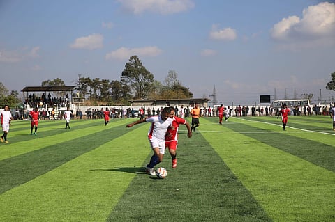 The lush green turf was shining bright on Thursday at Khliehriat that is dotted black after years of rat-hole coal mining. (Photo | Special Arrangement)