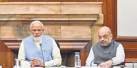 Modi and Amit Shah. (File Photo)