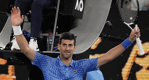 Novak Djokovic of Serbia celebrates after defeating Roberto Carballes Baena of Spain in their first round match at the Australian Open.(Photo | AP)