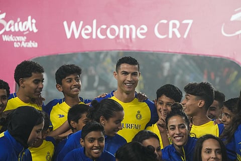 Cristiano Ronaldo smiles during his official unveiling as a new member of Al Nassr football club in Riyadh, Saudi Arabia. (Photo | AP)