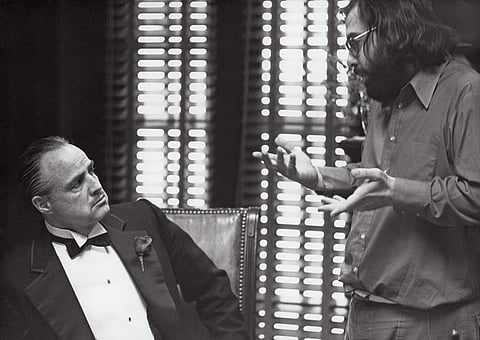 Francis Ford Coppola directing Marlon Brando in 'The Godfather' (1972). (Photo | Paramount Pictures)