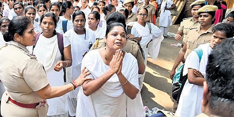 Police detain protesting nurses at the DMS campus on Tuesday | Ashwin Prasath