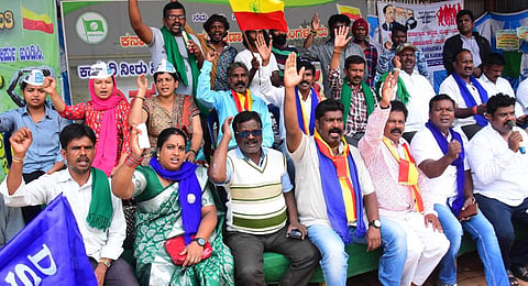 Members of the Karnataka Jala Samraskhana Samiti protest against the release of Cauvery water to Tamil Nadu in Bengaluru on Tuesday | Express