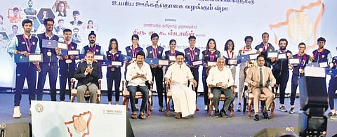 Chief Minister MK Stalin with the athletes from the state who bagged medals at the Asian Games | express