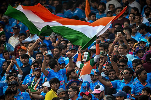 Fans cheering India during their World Cup match against Pakistan in Ahmedabad on Saturday. (Photo | AFP)