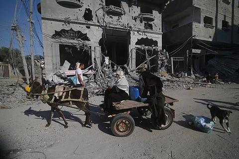 'It is a catastrophe for Palestinians, it is a Nakba,' political analyst Talal Awkal who is staying back says. 'They are displacing an entire population from its homeland.' (AP)