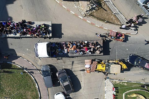 Palestinians flee from northern Gaza to the south after the Israeli army issued an unprecedented evacuation warning to a population of over 1 million people. (Photo | AP)