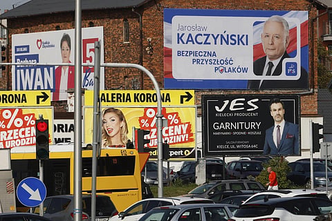 A political campaign billboard for the head of Poland's ruling party Jaroslaw Kaczynski hangs on a building in Kielce, Poland, Wednesday, Oct 11, 2023. (Photo | AP)