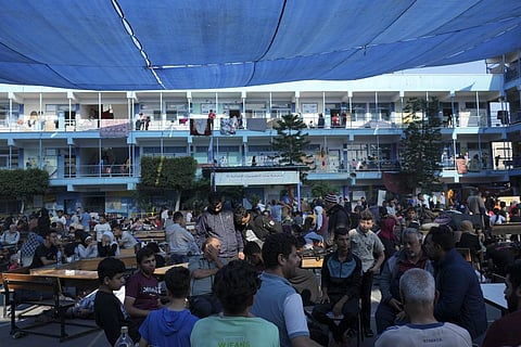 Palestinians take shelter in a U.N.-run school from the ongoing Israeli strikes on the Gaza Strip in Nuiserat refugee camp (Photo | AP)