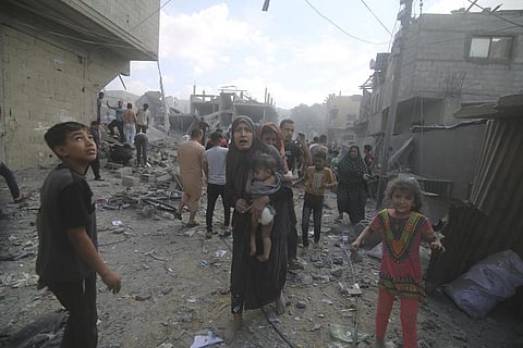 Palestinians flee Israeli bombardment of Rafah, southern Gaza Strip, Tuesday, Oct. 17, 2023. (Photo | AP)
