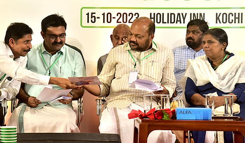 Industries Minister P Rajeeve, Mayor M Anilkumar and K A Rajesh, CIPET Kochi director, at the launch event of biodegradable paper products. (Photo |A Sanesh)