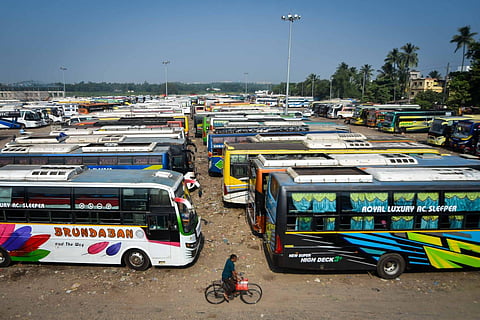 Private buses parked at Baramunda bus stand in Bhubaneswar on Friday.(Photo | Debadatta Mallick)