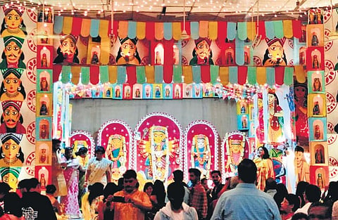 With this year’s theme being ‘Baro Mashe, Tero Parbon’ (12 months, 13 festivals) the Ulsoor Bengalee Association pandal uses reuseable cardboard and jute for decoration, which includes 350 holy figuri