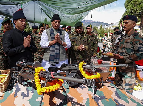 Defence Minister Rajnath Singh carrying out Shastra Puja with the troops at Tawang, Arunachal Pradesh. (Photo | Rajnath Singh Twitter)