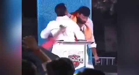 BRS MLA KP Vivekananda manhandled his rival and BJP candidate Kuna Srisailam during a public debate