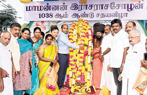 Deepak Jacob, Thanjavur collector, garlands the statue of Raja Raja Chola outside the temple. (Photo | Express)