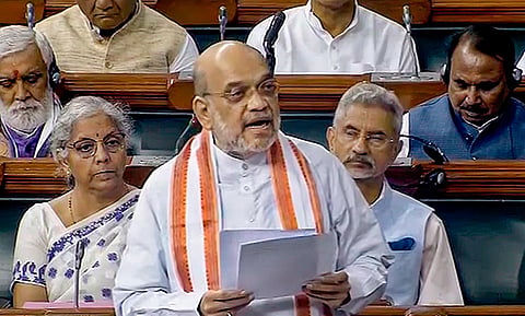 FILE - Home Minister Amit Shah speaks in the Lok Sabha during the Monsoon session of Parliament, in New Delhi, Friday, Aug. 11, 2023 (Photo | PTI)