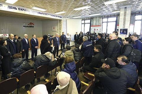 Kazakh President Kassym-Jomart Tokayev, center left, expresses condolences to the families and friends of the miners who died in the fire in Karaganda. (Photo | AP)