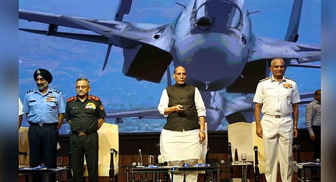 Defence Minister Rajnath Singh, Chief of Defence Staff General Anil Chauhan and Chief of the Naval Staff Admiral R Hari Kumar in the event | PTI