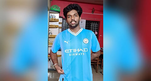 Deva Narayanan wearing the jersey signed by Erling Haaland | express