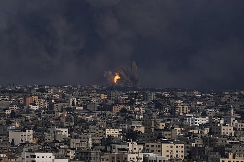 Fire and smoke rise following an Israeli airstrike, in Gaza City, Sunday, Oct. 8, 2023. (Photo | AP)