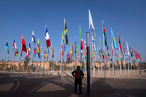A member of the security forces stands guard outside a convention centre hosting the IMF and World Bank annual meetings, in Marrakech, Morocco, Sunday, October 8, 2023. (Photo | AP)