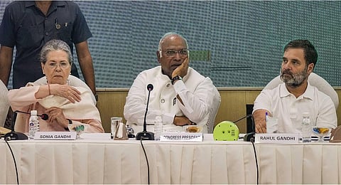 Congress President Mallikarjun Kharge with party leaders Sonia Gandhi and Rahul Gandhi. (Photo | PTI)